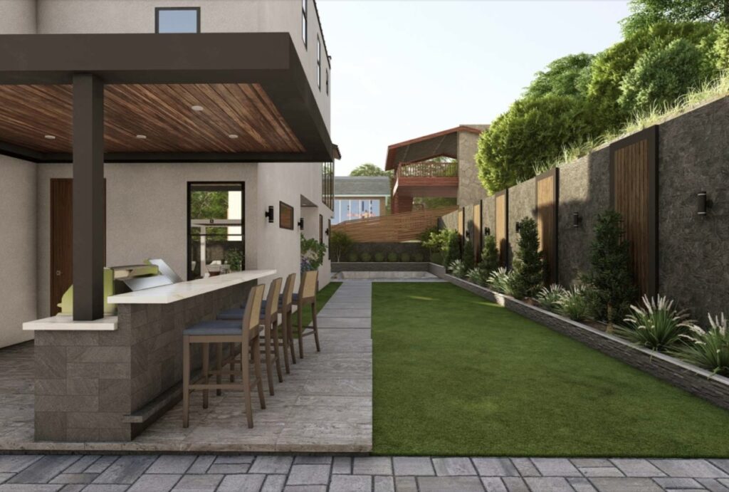 Modern Salt Lake City backyard with an outdoor bar and stools, a covered patio area, a long green lawn, and beautifully landscaped garden beds along a privacy wall—perfect example of thoughtful landscape design.