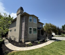 Custom flagstone pathway installed with proper base preparation.