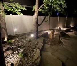 Landscape Lighting, Rock Retaining wall, Water Feature, Plants, Rocks, Flagstone Patio